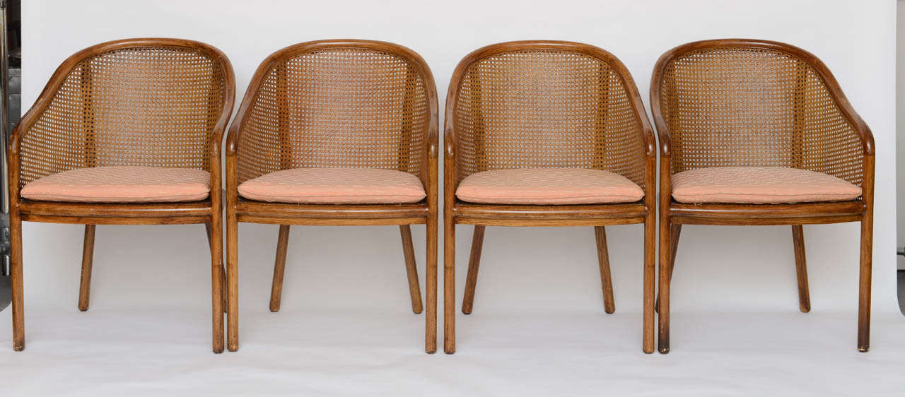 4 Cane and Ashwood chairs by Ward Bennett for Brickell. Canning is original and in perfect condition.  Can sell as pairs or as four.  Price listed is for the set of 4.