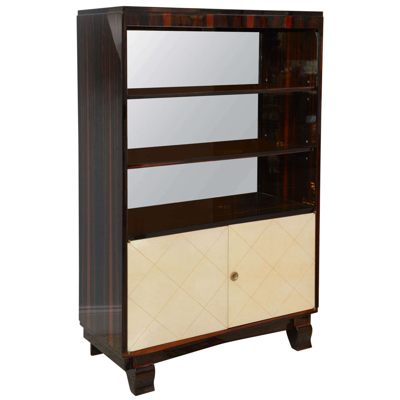 Art Deco Ebony De Macassar and Parchment Bookcase, Jean Pascaud For Sale