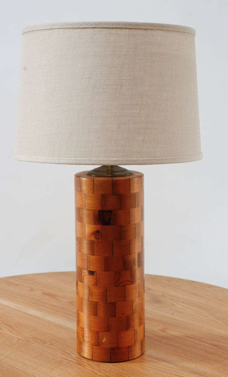 Handsome cylindrical table lamp in butcher block / brick work pattern. Newly rewired. Linen drum shade (18