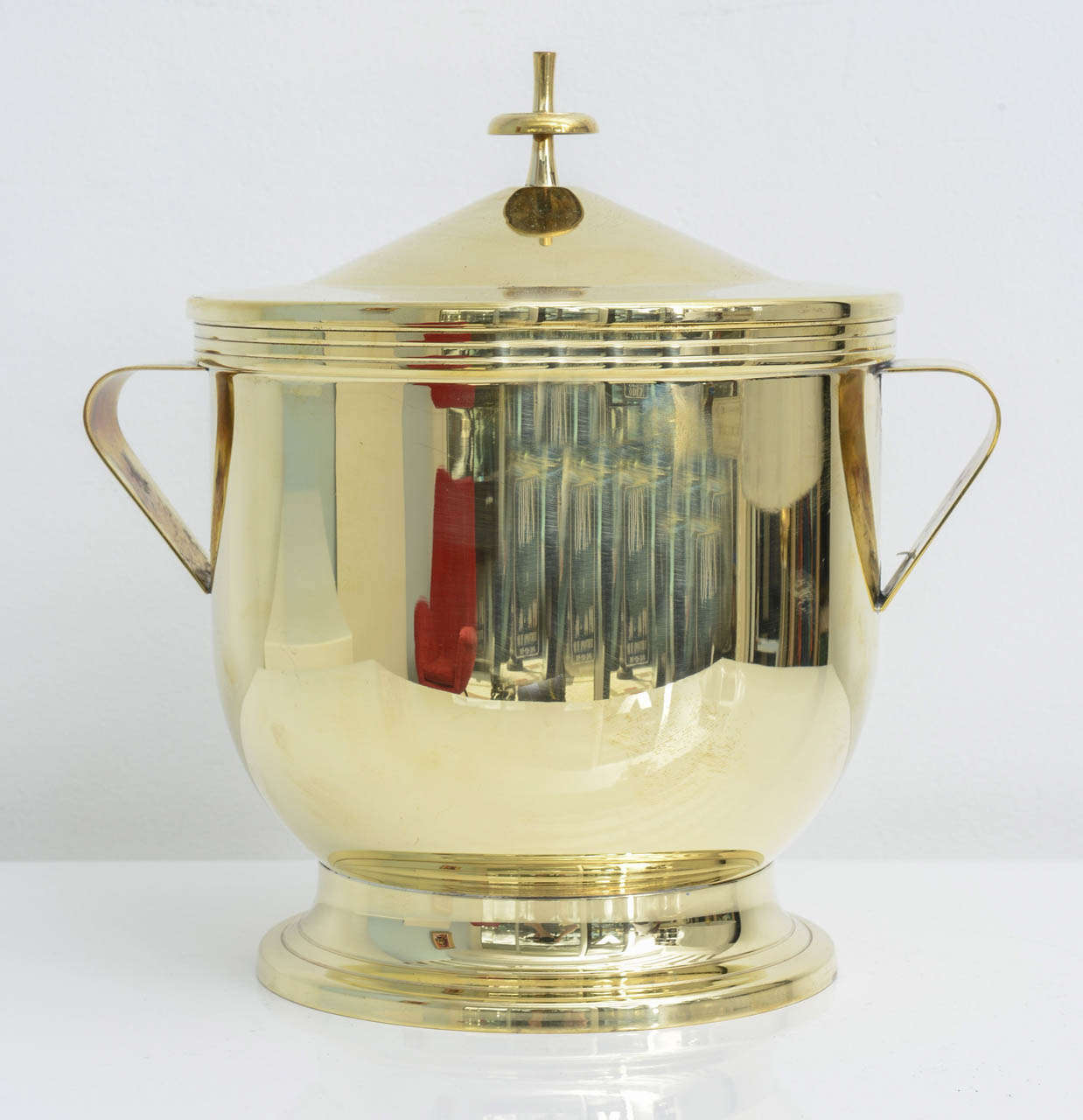 Polished Tommi Parzinger polished brass covered ice bucket For Sale