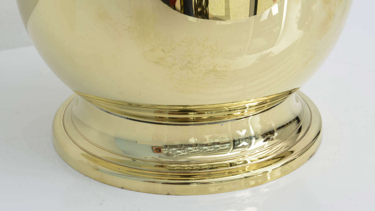 20th Century Tommi Parzinger polished brass covered ice bucket For Sale