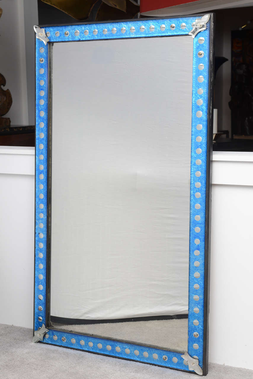 Mid Century ,Rectangular Mirror with a blue glass frame including silver  Dots  as a geometrical decorations, 
circa 1940. 
Wooden original back.