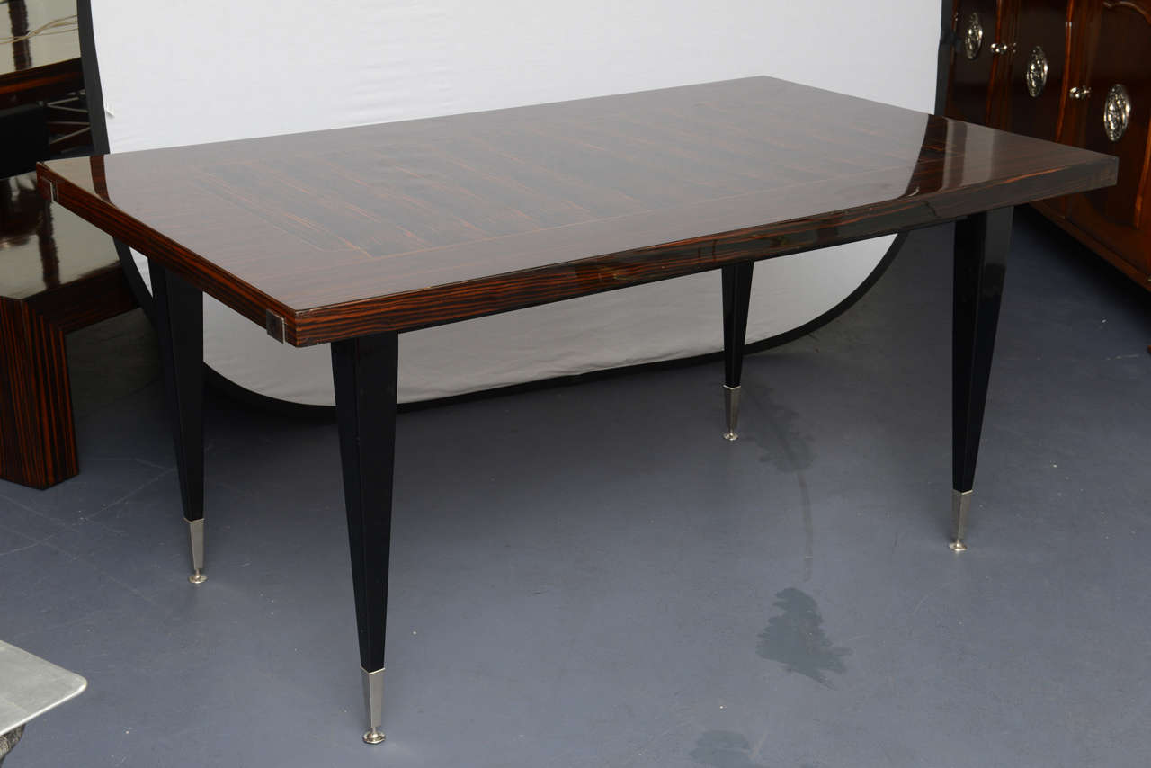 Midcentury Macassar Table

Possible leaves.
Good condition.