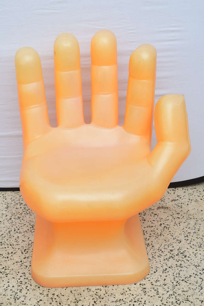 Fun iconic plastic hand chair from late 1960s USA