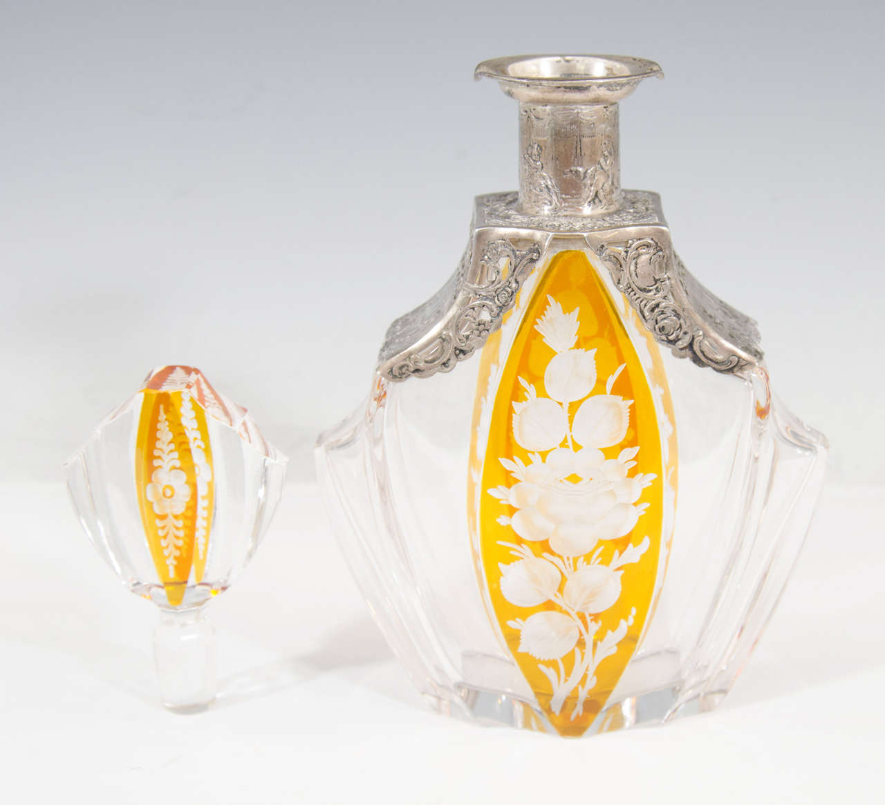 20th Century A Vintage Crystal and Amber Color Decanter with Silver Overlay