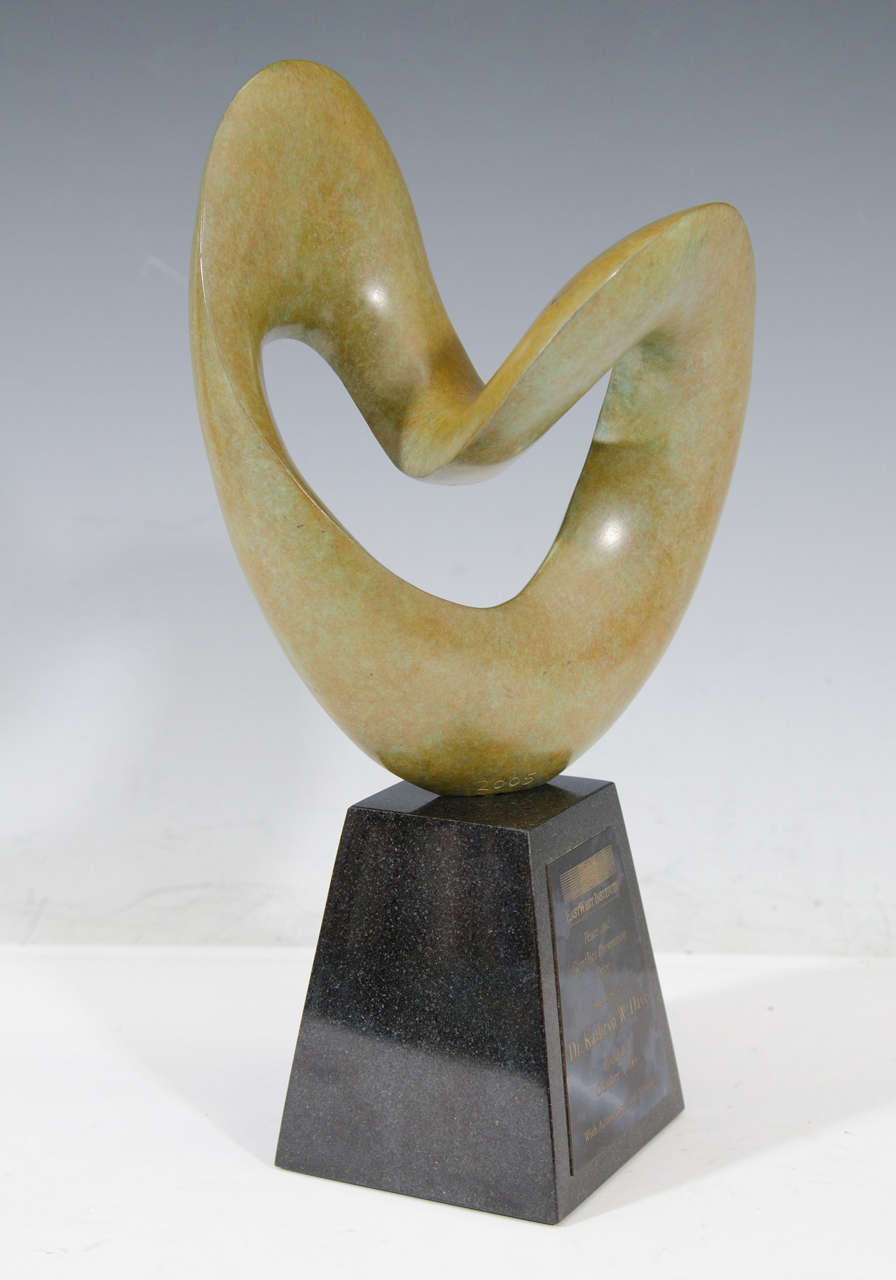 An abstract bronze sculpture by Richard Erdman. This piece of art was presented as an award to Dr. Kathryn W. Davis by the EastWest Institute for her work on peace and conflict prevention in Potsdam, October 7, 2006.