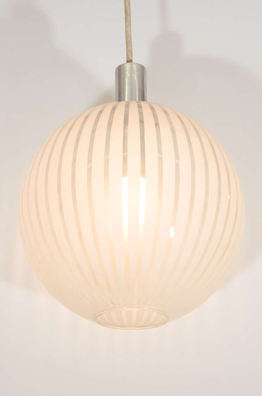 Mid-Century Modern An Italian Midcentury Clear Glass Globe Pendant with White Stripes For Sale