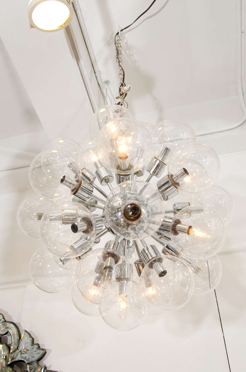 A vintage Sputnik chandelier with bubble shaped glass globes on a chrome frame by Lightolier.