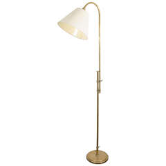 A Midcentury Brass Floor Lamp with Adjustable Pole