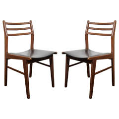 A Danish Modern Set of Eight Dyrlund Dining Chairs