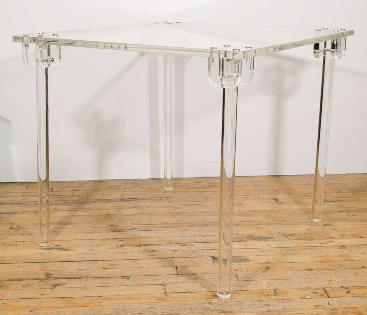 A vintage folding Lucite game table by Charles Hollis Jones. Great space saver.