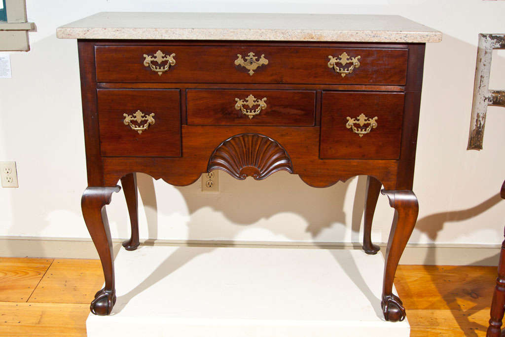 Attributed to Newport's cabinetmaker John Goddard, this is a  Newport Chippendale high chest base with a later marble top resting on top of the case. The original top of this highboy has been long lost in time and history. It was found in an estate