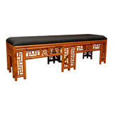 Chinese Bamboo bench with upholstered top.