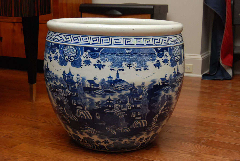 Pair of large blue and white fish bowls. Chinese.<br />
The price is for the pair.