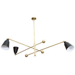 An Italian Brass and Black Enamel Three Light Adjustable Ceiling Fixture.