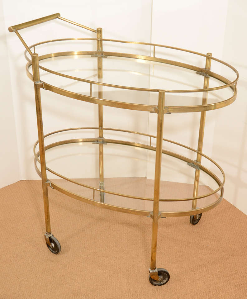 Brass Bar Cart with great lines. Will work well in all decors. Solid brass.