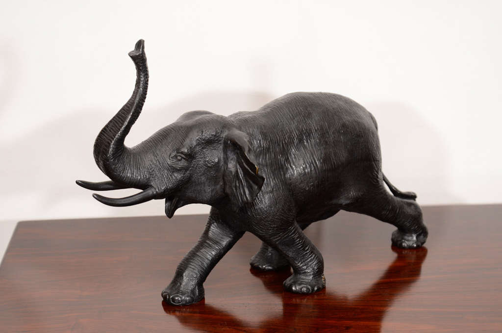 Bronze elephant sculpture high detailing and form of significant weight.