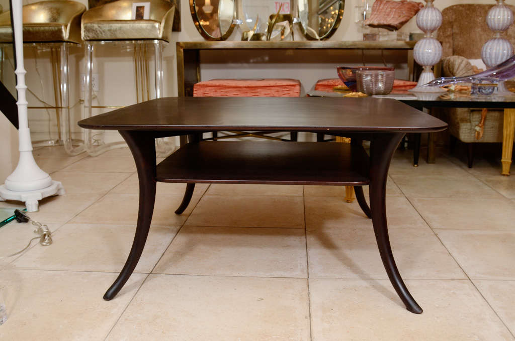 Ebonized wood two tier square coffee table with saber legs by Robsjohn-Gibbings.

View our complete collection at www.johnsalibello.com