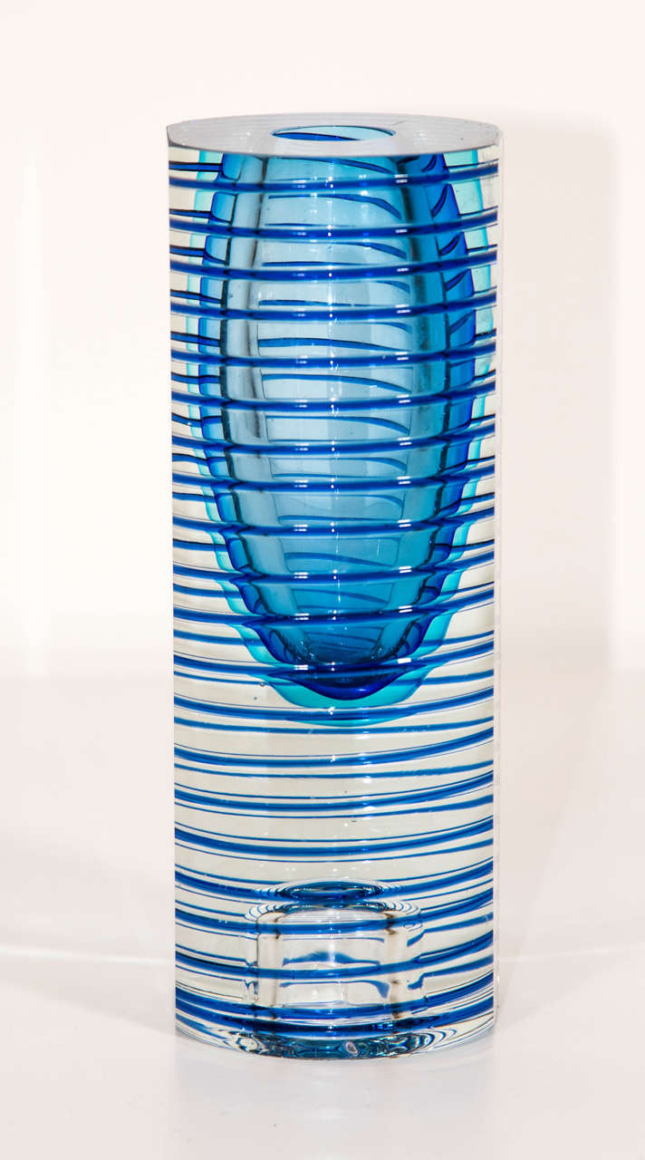 This unusual Murano vase 
with blue ridges and colouring,
doubles as a vase or turn it upside down and it is a candle holder......beautiful and functional!