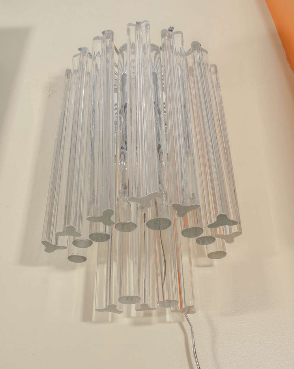 Beautiful single wall sconce with two tiers of venini crystals: some of the crystals are triede and some are the uncommon round rods. Chrome armature. Please contact for location.