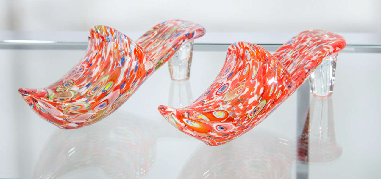 A delightful pair of Murano slippers done in the millefiori technique. They are a pair, but differ very slightly in color because each one is handblown. Please contact for location.