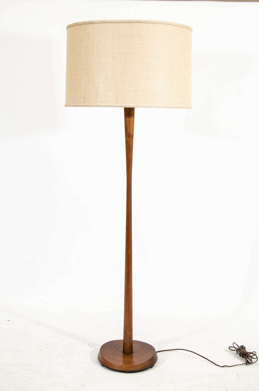 Handsome teak floor lamp imported from Denmark by Laurel with a lovely taper on the rod and nicely sculpted concave weighted base with teak veneer. Please contact for location.