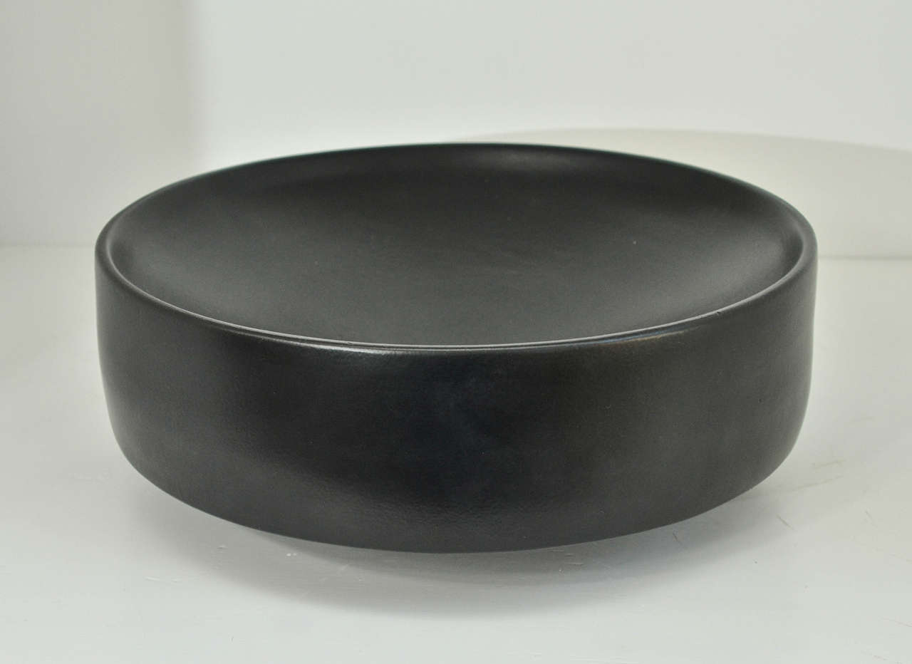 Simple modern hand thrown ceramic bowl with matte black glaze.  By master ceramicist Miri Mara.