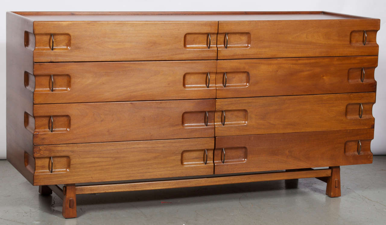 An Eight Drawer walnut chest by Edmond Spence for Industria
Mueblera of Mexico. Model 9-C/30.