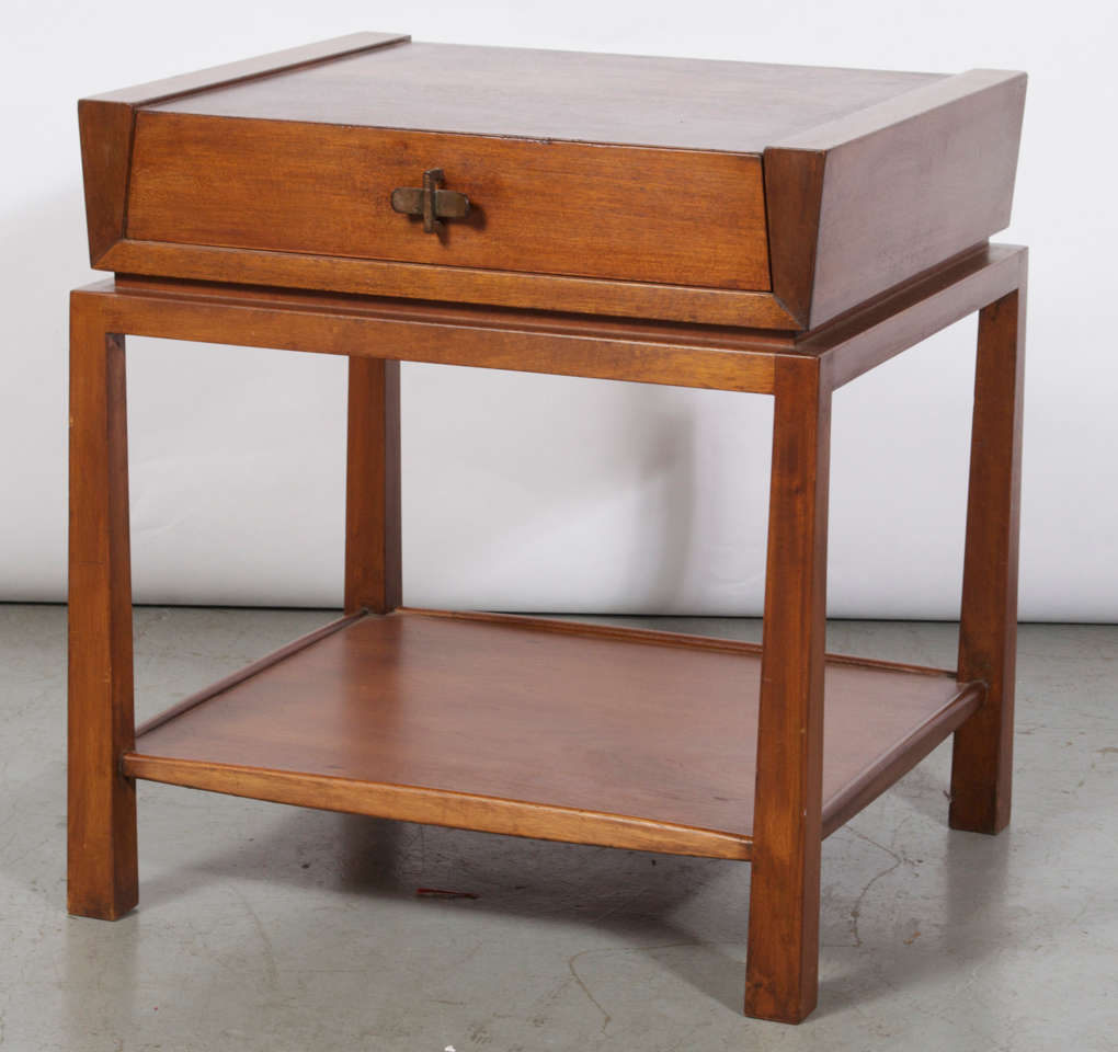 An Edmond Spence End table in Walnut and Cherry with a single drawer with cast bronze pull. Great profile with tapering legs & floating drawer cassette. Model 53.