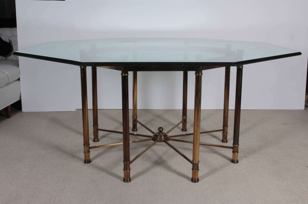 Directoire style table with original glass octagon top and beautiful brass patina.

This item is currently on view at our Manhattan showroom:
 200 Lexington Ave (33rd & Lex) - 10th Floor, NYC.