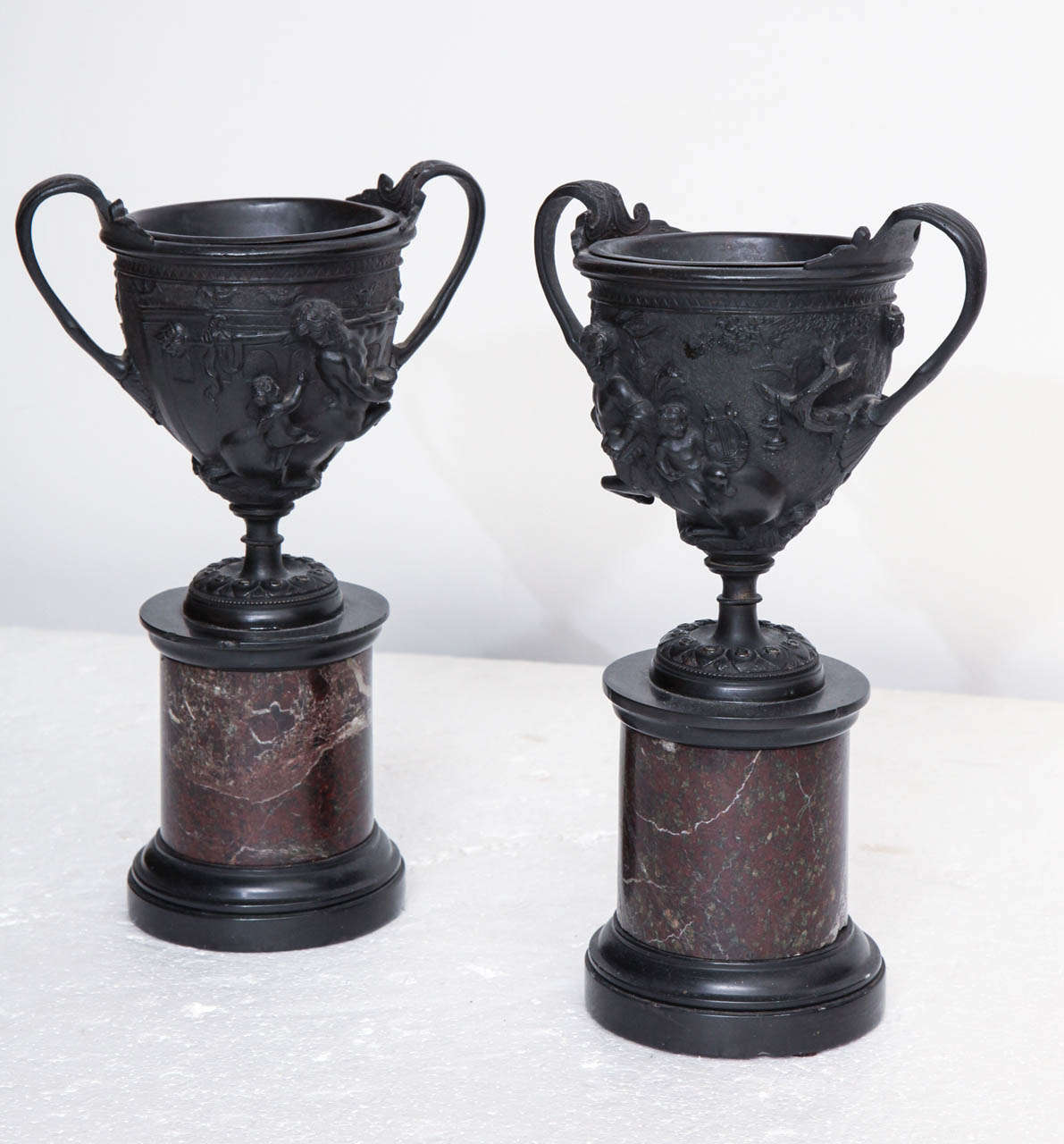 Pair of 19th Century French, Bronze Urns on Marble Socles