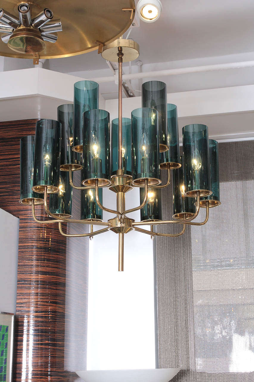 Fantastic Mid Century classic 2 tier brass chandelier with smoked blue glass tubes.