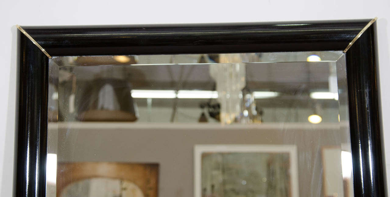 20th Century Black Lacquered Wall Mirror with Gold Corner Accents