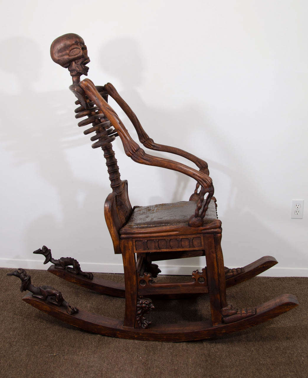 An Antique Hand-Carved Skeleton Rocking Chair In Good Condition In New York, NY