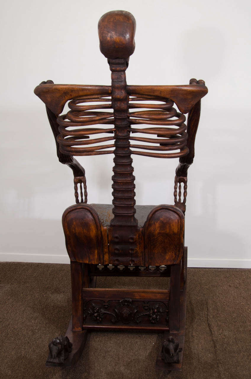 An Antique Hand-Carved Skeleton Rocking Chair 1