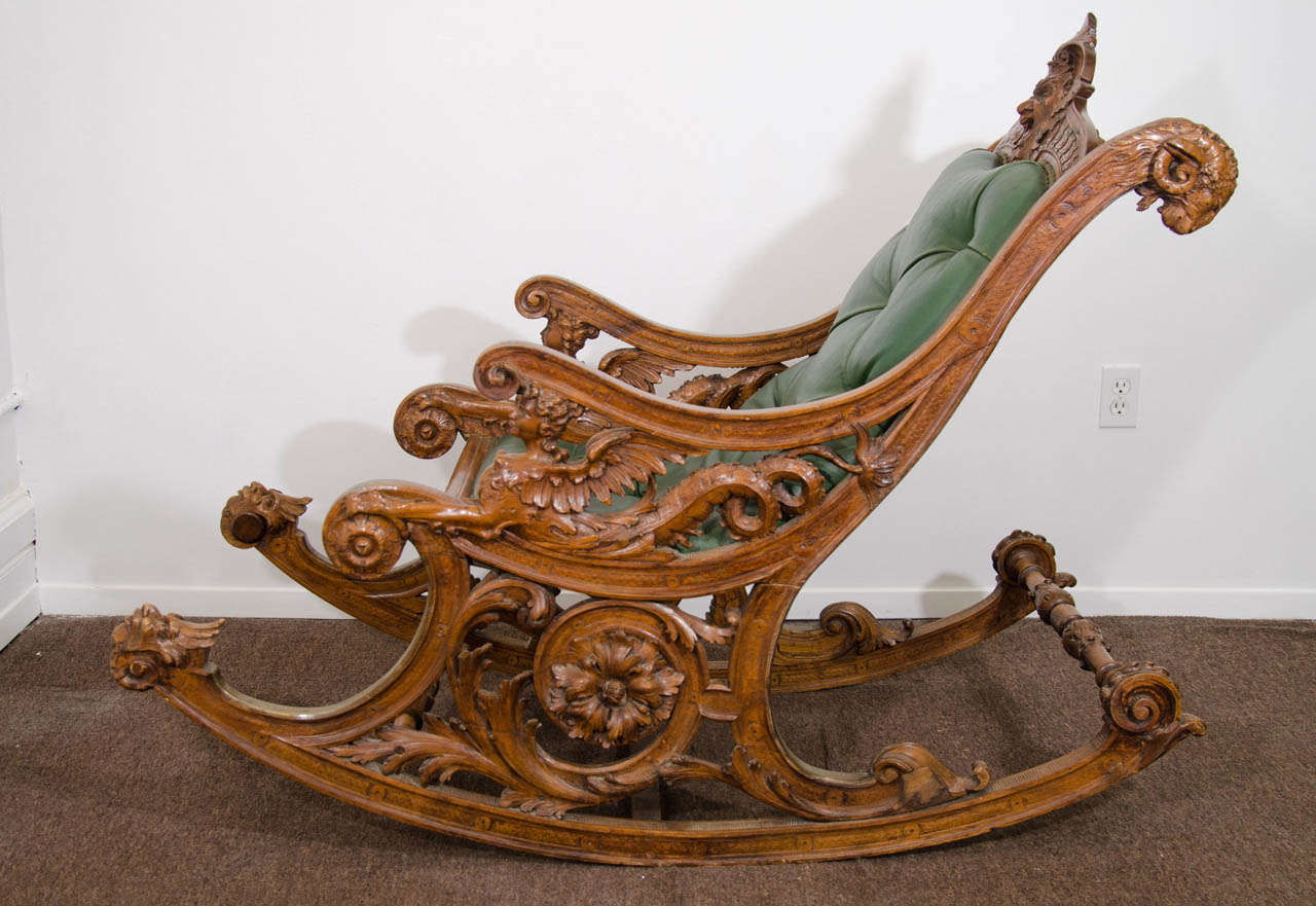 A 19th Century Carved Italian Rocking Chair w/Griffins & Rams Heads In Good Condition In New York, NY