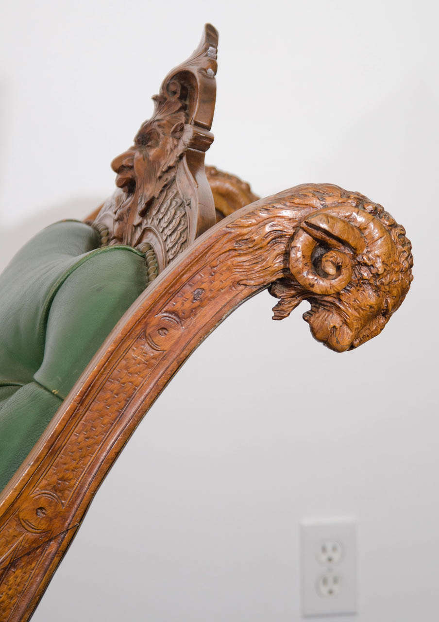 A 19th Century Carved Italian Rocking Chair w/Griffins & Rams Heads 1