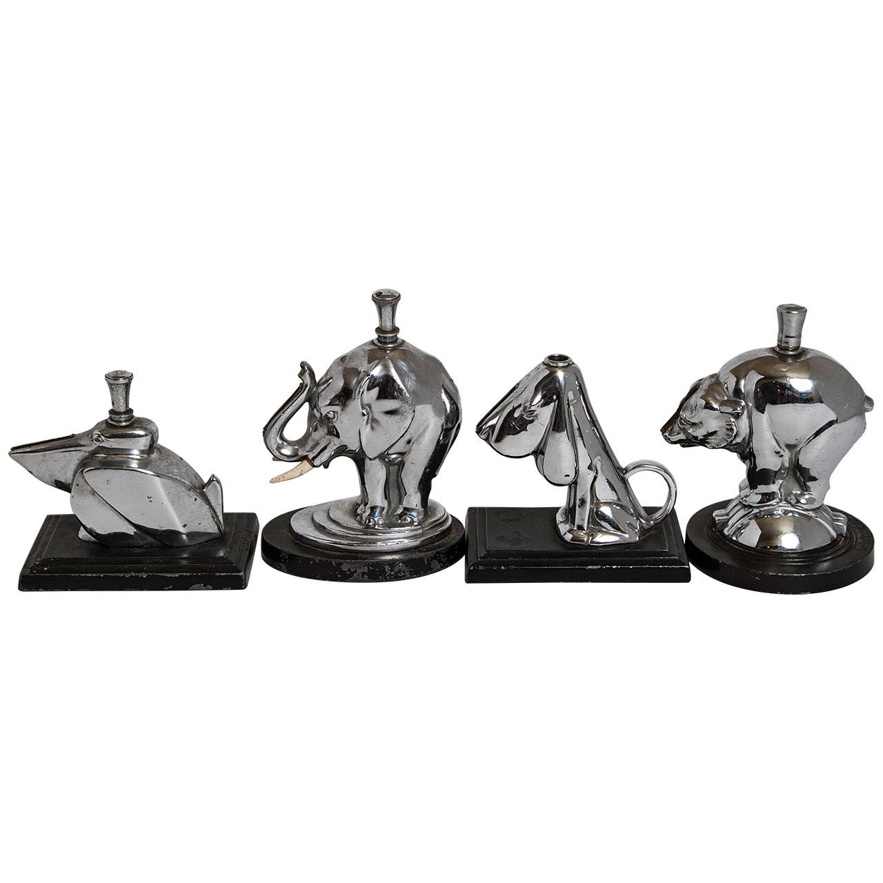 Set of Four Original Ronson Figural Striker Lighters For Sale