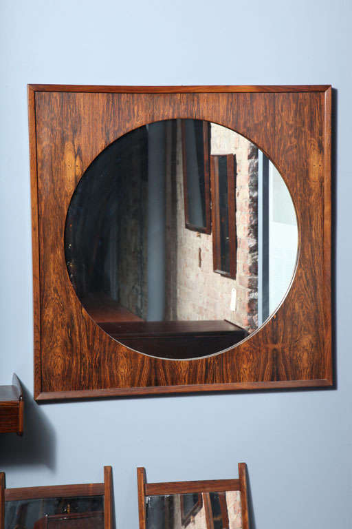 Vintage 1960s Danish Square Mirror Rosewood Frame and Round Mirror. Scandinavian Housewares.  Located at ABC Home 2nd Floor. New York, NY 646-602-3391.

Round Mirror with Square Rosewood Frame.  Features amazing wood grain.  Mirror is