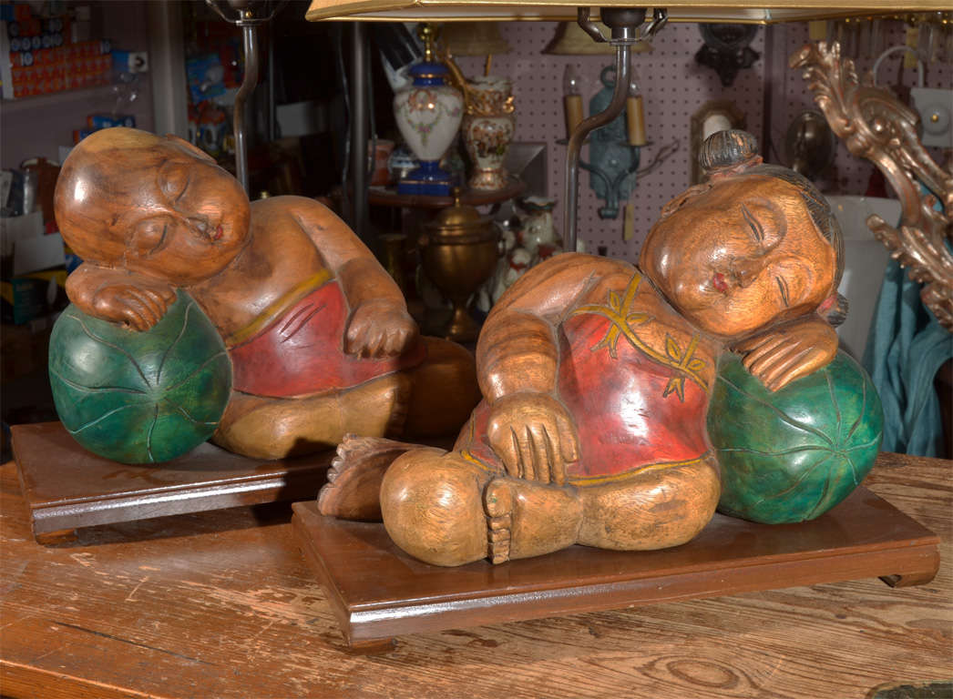 Mid-20th Century Thailand Carvings mounted as table lamps.