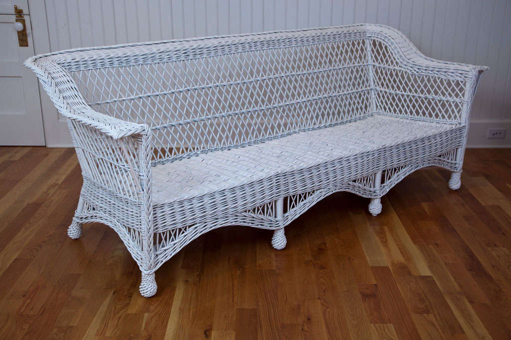 Huge willow Bar Harbor wicker sofa with woven seat and shelf back and arms. Could easily be used as a daybed. Sturdy and comfortable.

Dimensions: 90" wide, 36" deep, 34.5" high.