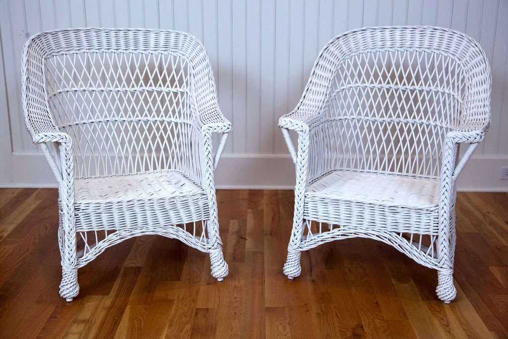Antique Bar Harbor wicker chairs with fully woven seats and pineapple feet.    Large scale, sturdy and comfortable.

Dimensions:  30