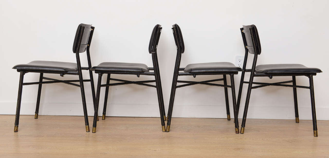 French Four Hand Stitched Black Leather Chairs by Jacques Adnet