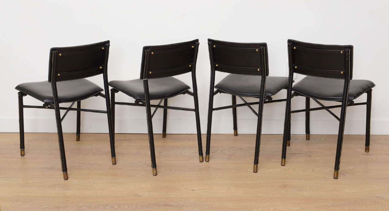 Four Hand Stitched Black Leather Chairs by Jacques Adnet In Excellent Condition In Miami, FL