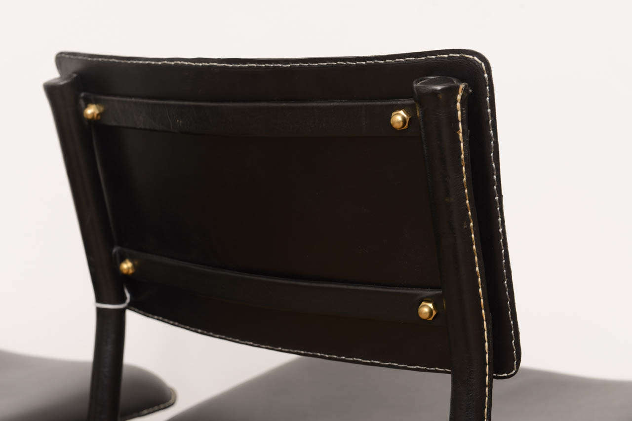 Four Hand Stitched Black Leather Chairs by Jacques Adnet 2