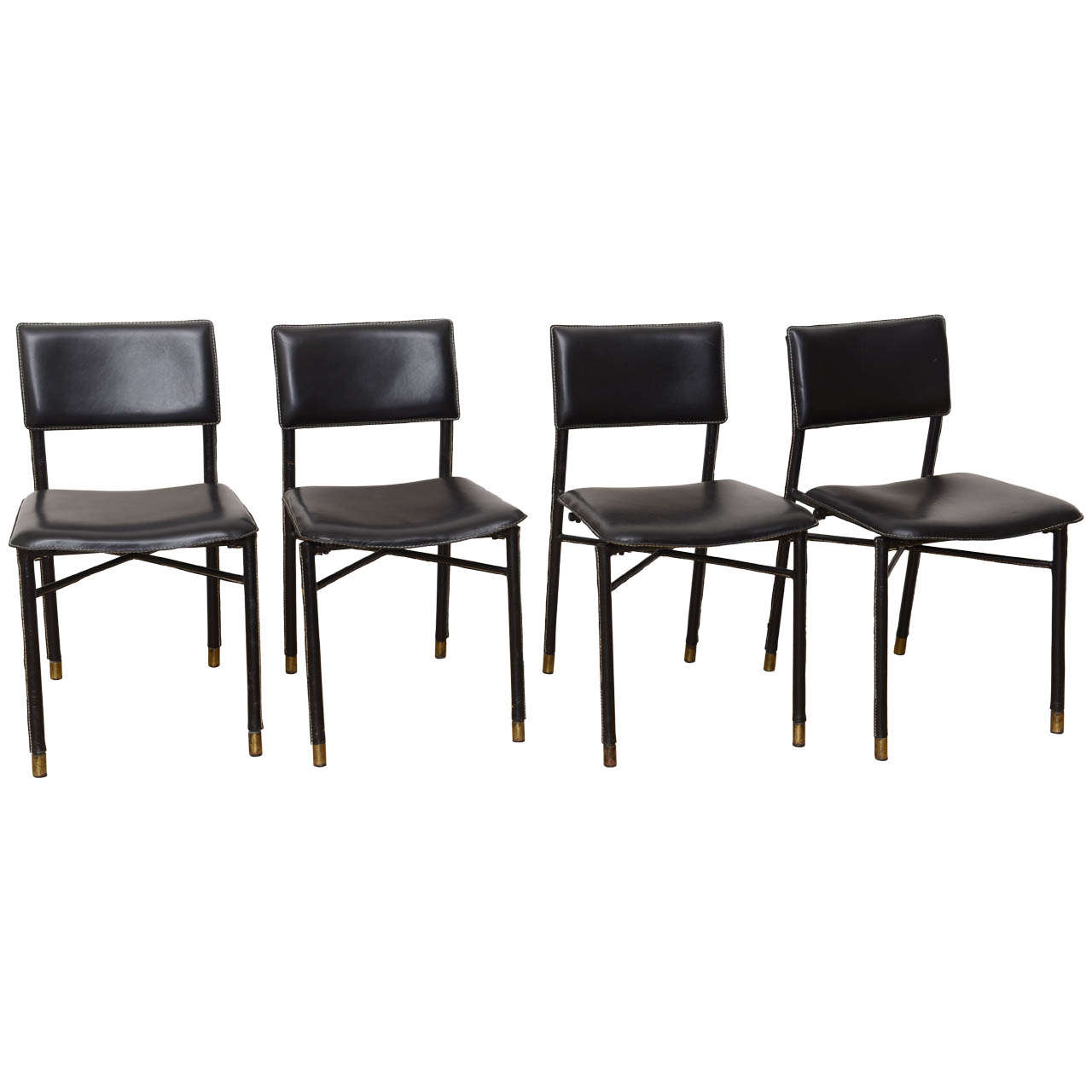 Four Hand Stitched Black Leather Chairs by Jacques Adnet