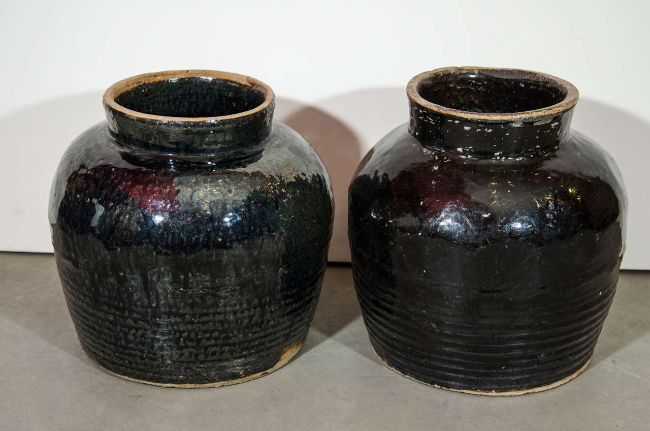Two nicely shaped and glazed wide mouthed antique Chinese ceramic food jars. Priced individually. From Shanxi province, circa 1900.
CR601/ CR466a.
