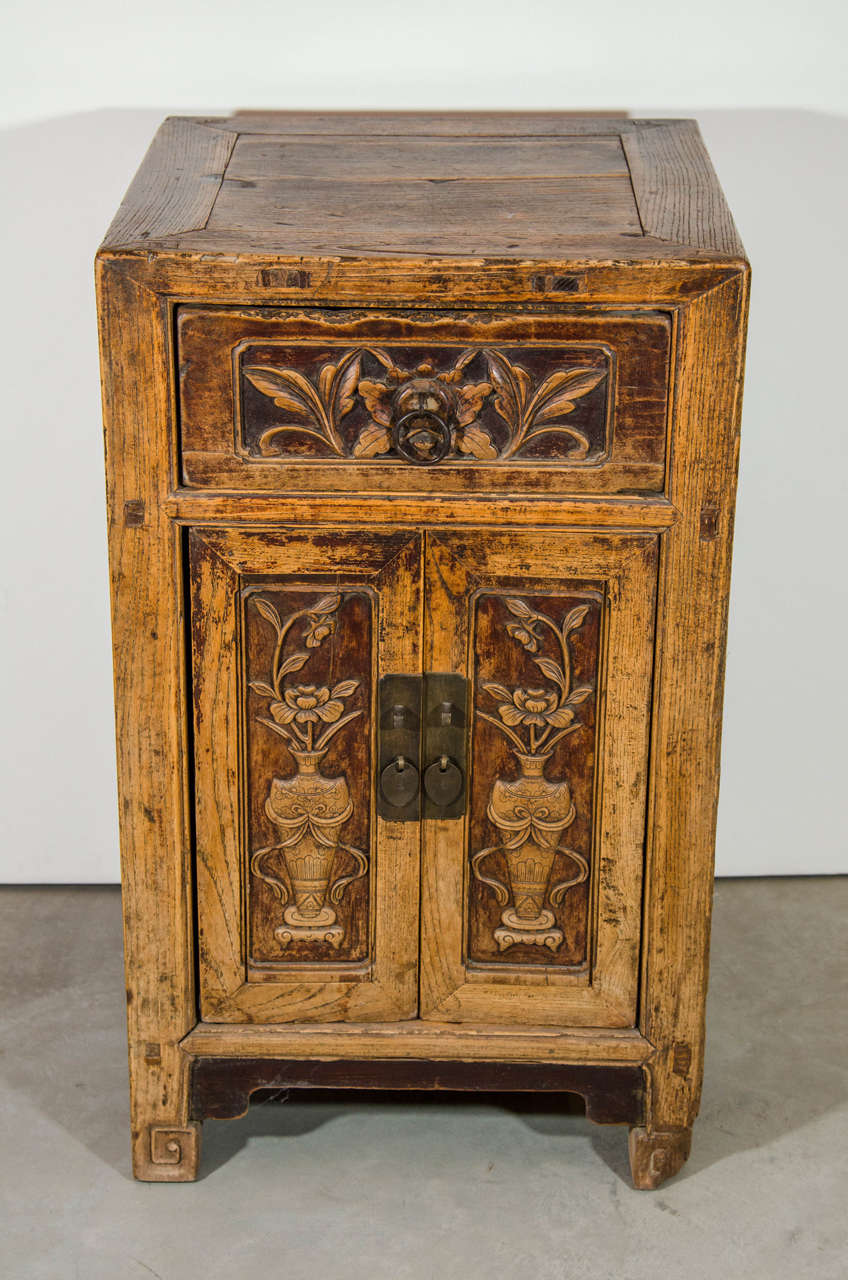 A finely carved 19th century Chinese cabinet with different, beautifully rendered images on three sides. A distinctive and rare piece, Shanxi province, circa 1850.
C488.
