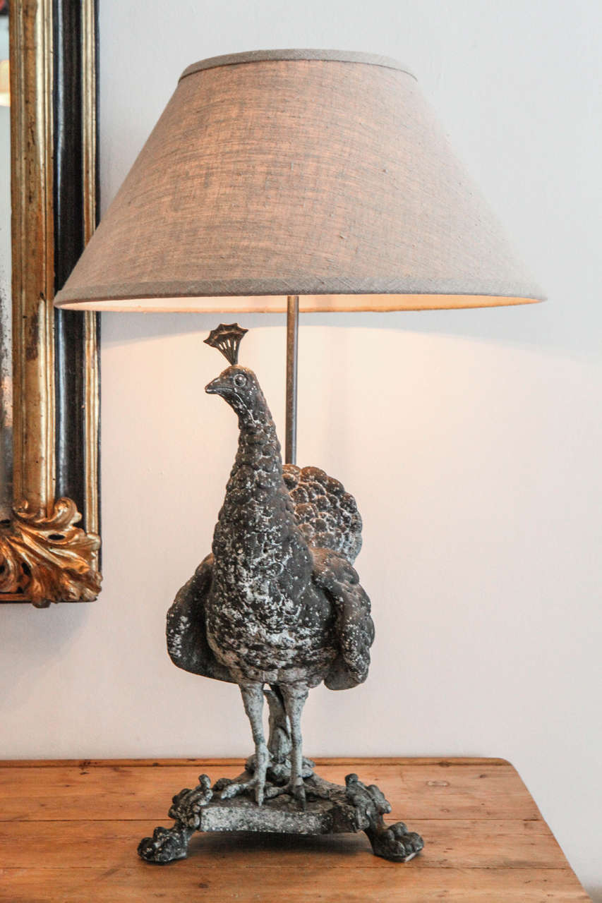 A pair of exquisite peacock lamps from France in they're beautiful patina.
Sold only as a pair.