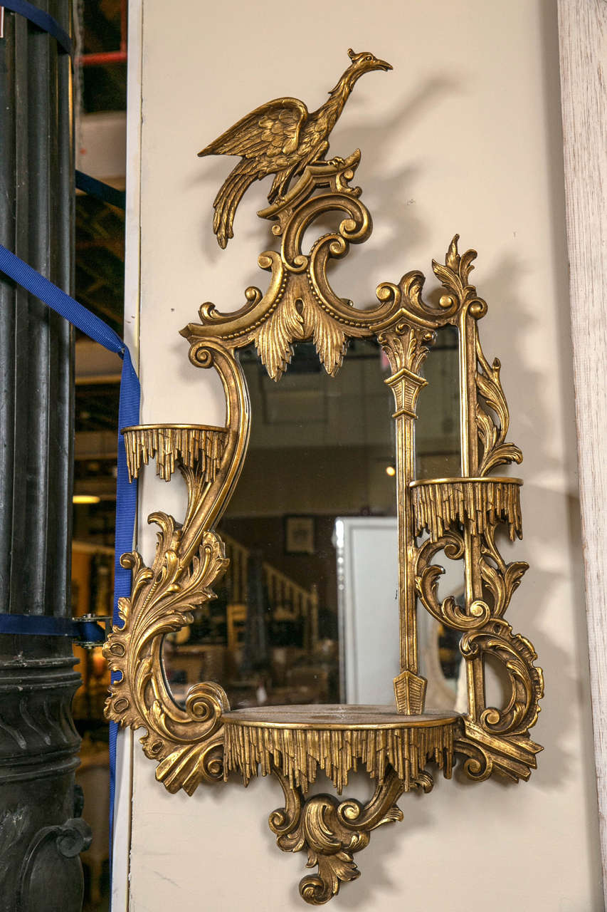 Pair of Giltwood Opposing Eagle Carved Mirrors with Shelves